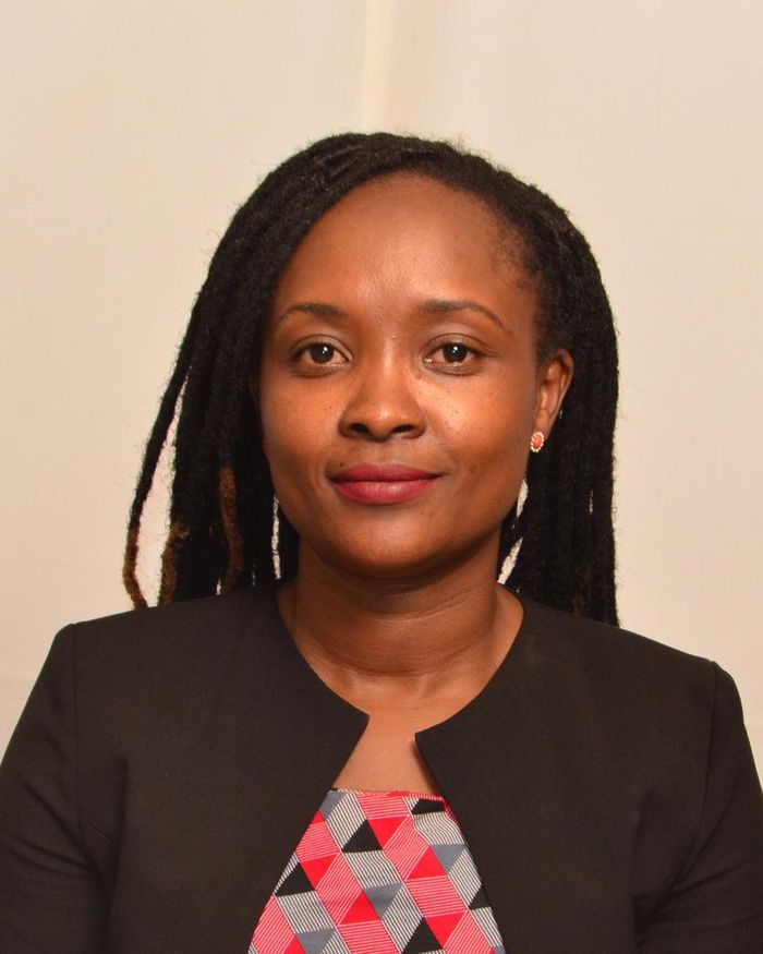 President-Elect Mercy Wacera in a dark jacket